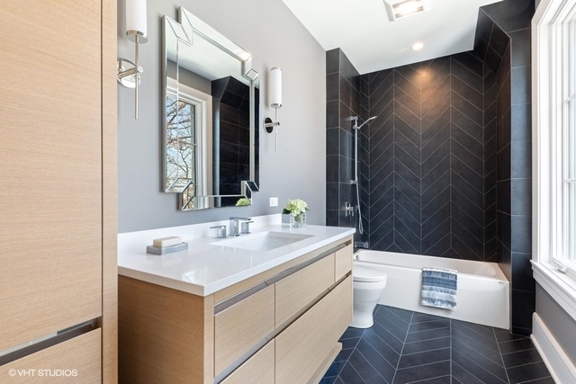 744 Taft Road Hinsdale, IL 60521 - Photo 31 of 37 a bathroom with a sink and a mirror