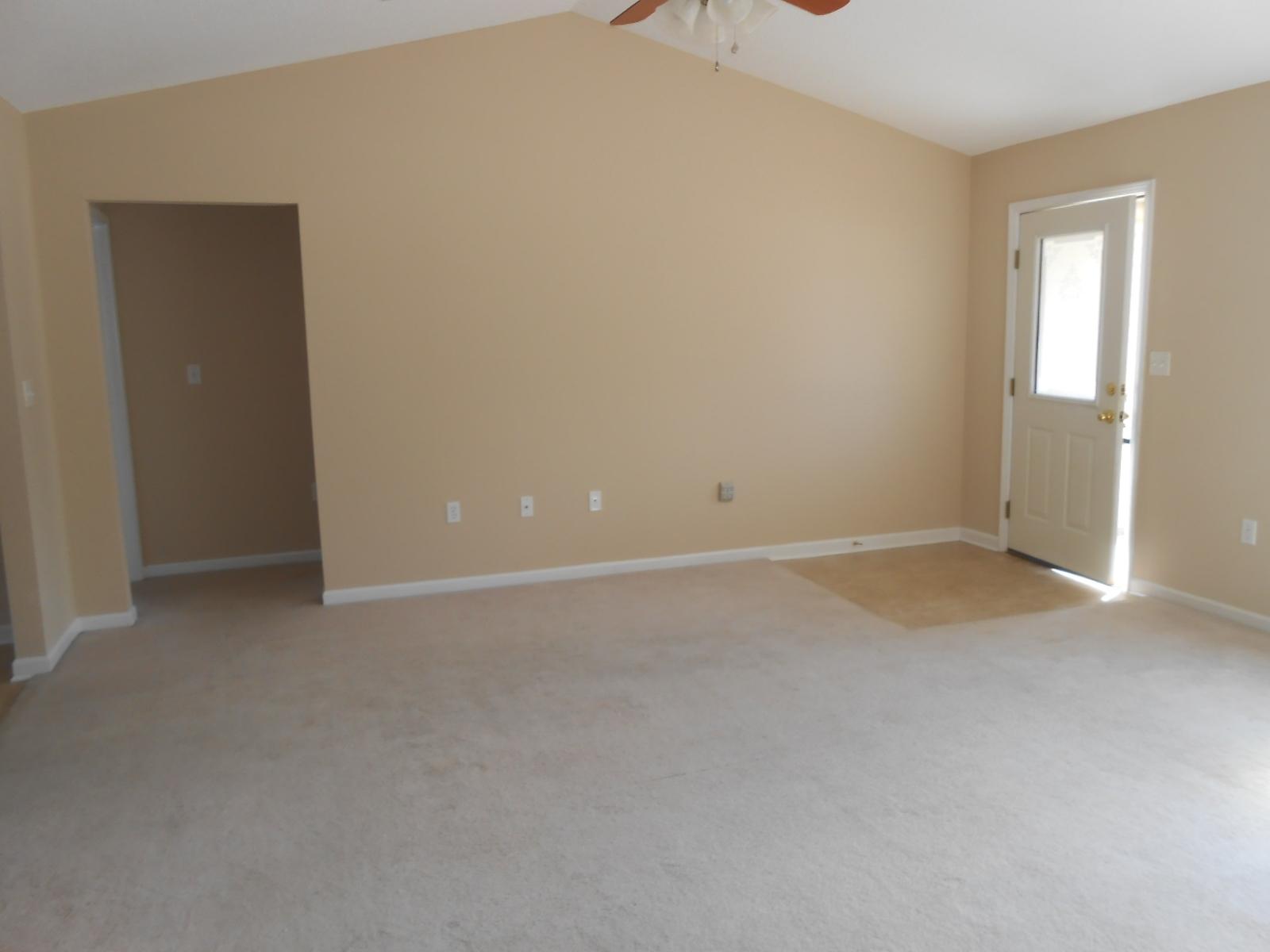 145 Laurel Lane DeFuniak Springs, FL 32433 - Photo 3 of 13 a view of an empty room with a window