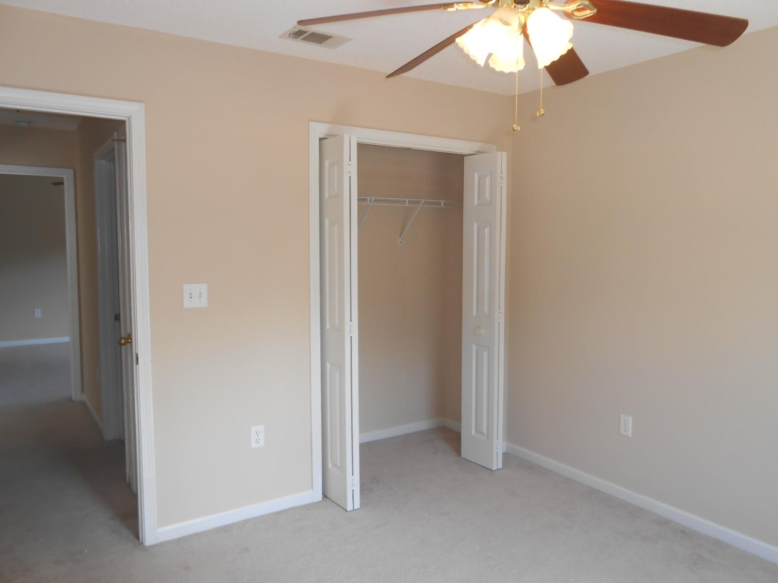 145 Laurel Lane DeFuniak Springs, FL 32433 - Photo 4 of 13 an empty room with a bathroom