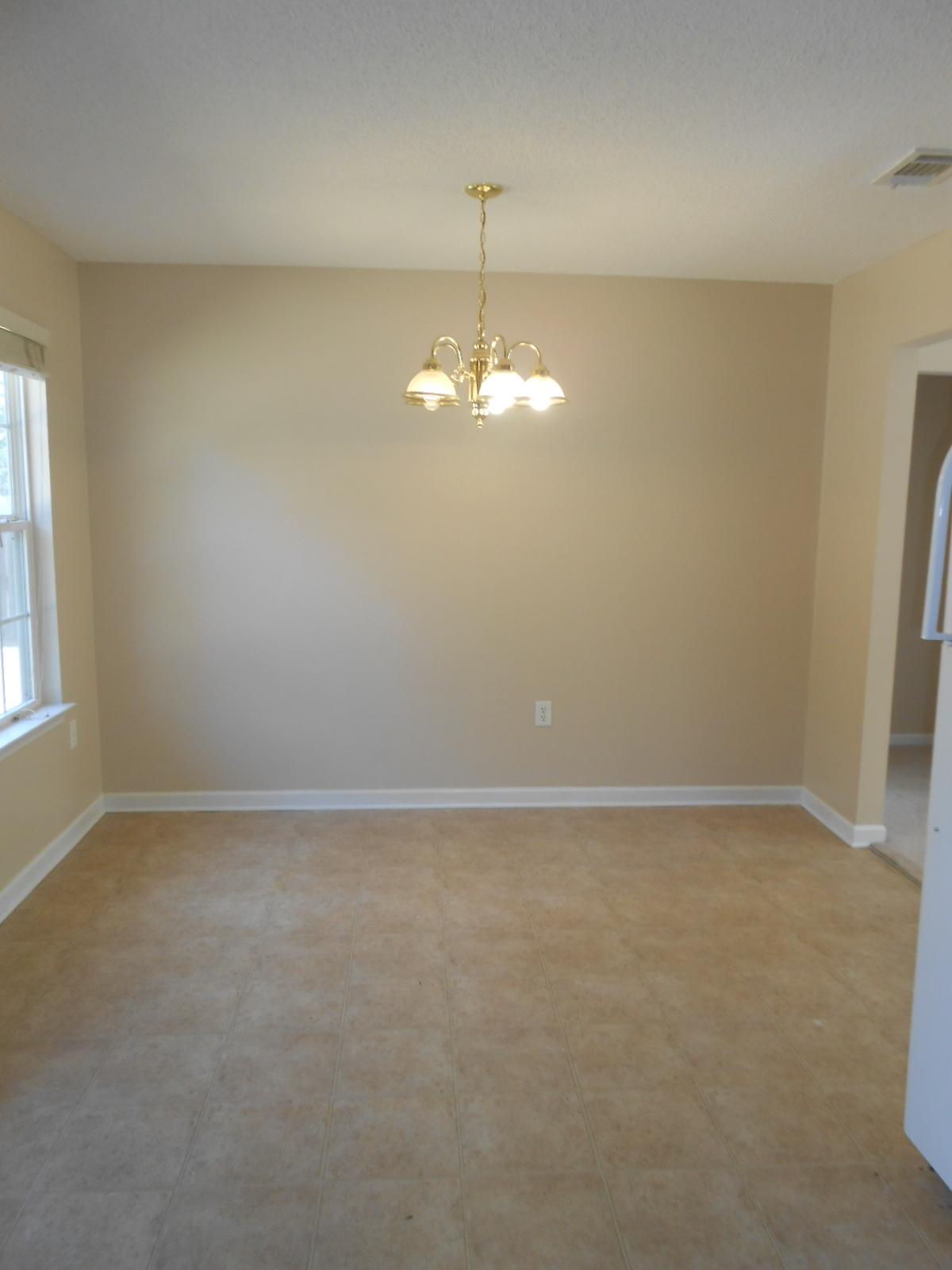 145 Laurel Lane DeFuniak Springs, FL 32433 - Photo 10 of 13 an empty room with a window