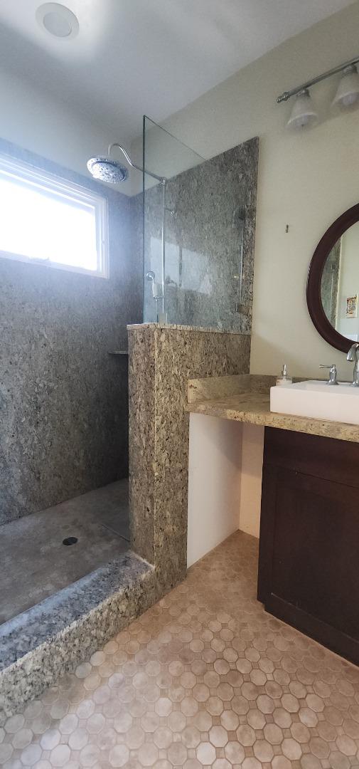 690 Madison Street Santa Clara, CA 95050 - Photo 16 of 27 a bathroom with a sink and a mirror