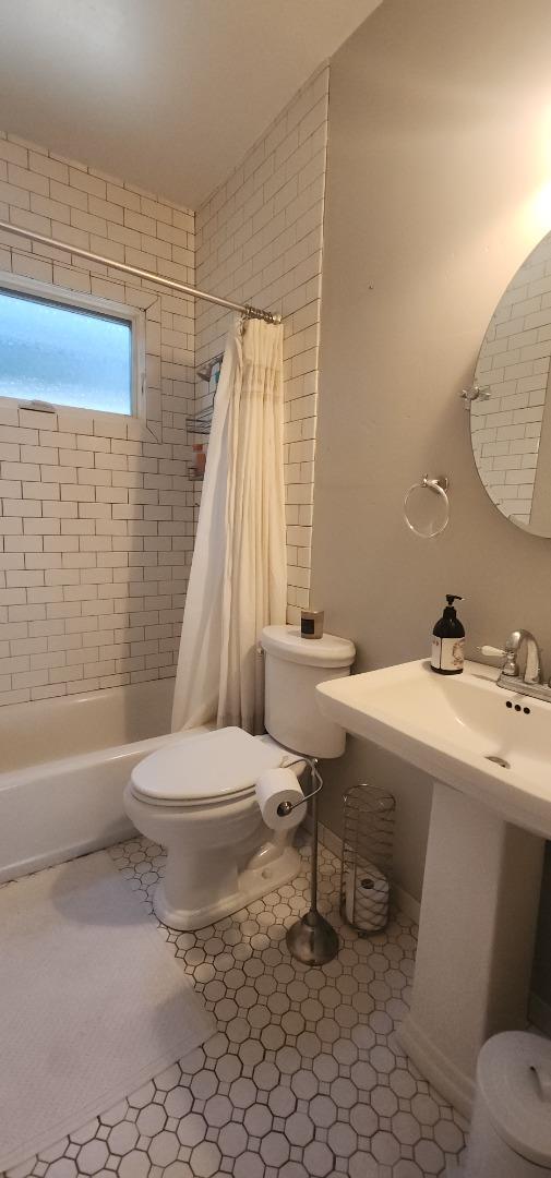690 Madison Street Santa Clara, CA 95050 - Photo 20 of 27 a bathroom with a sink toilet and shower