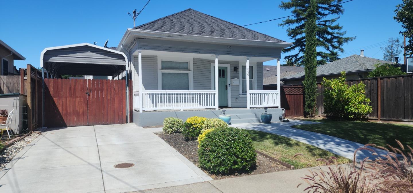 690 Madison Street Santa Clara, CA 95050 - Photo 3 of 27 a front view of a house with garden