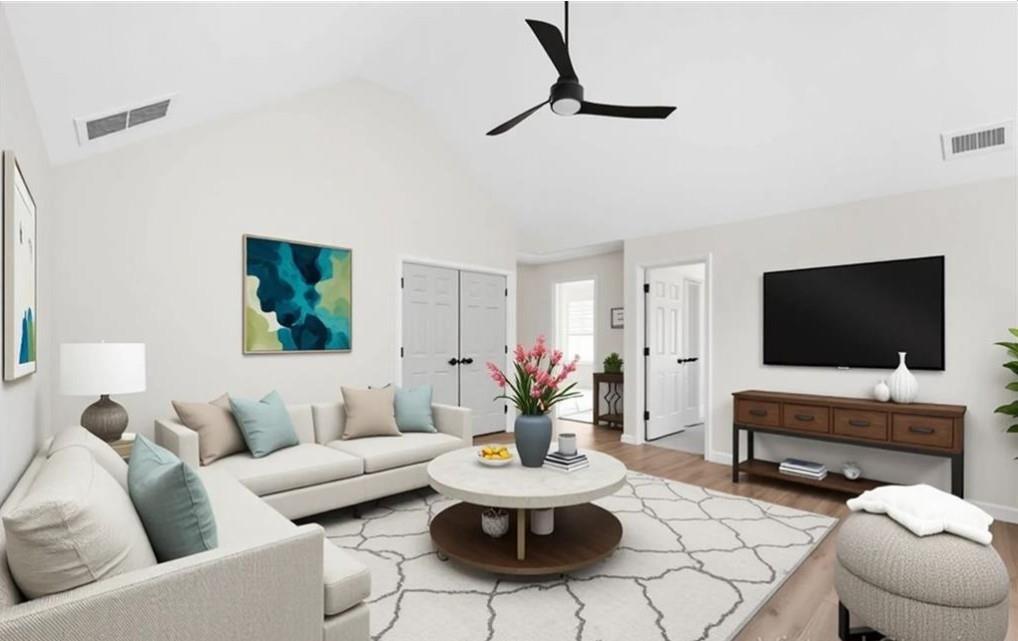 4095 Arch Pass Cumming, GA 30040 - Photo 13 of 31 a living room with furniture and a flat screen tv