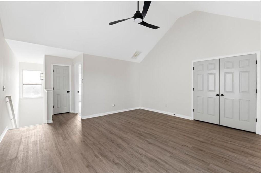 4095 Arch Pass Cumming, GA 30040 - Photo 14 of 31 a view of an empty room with wooden floor