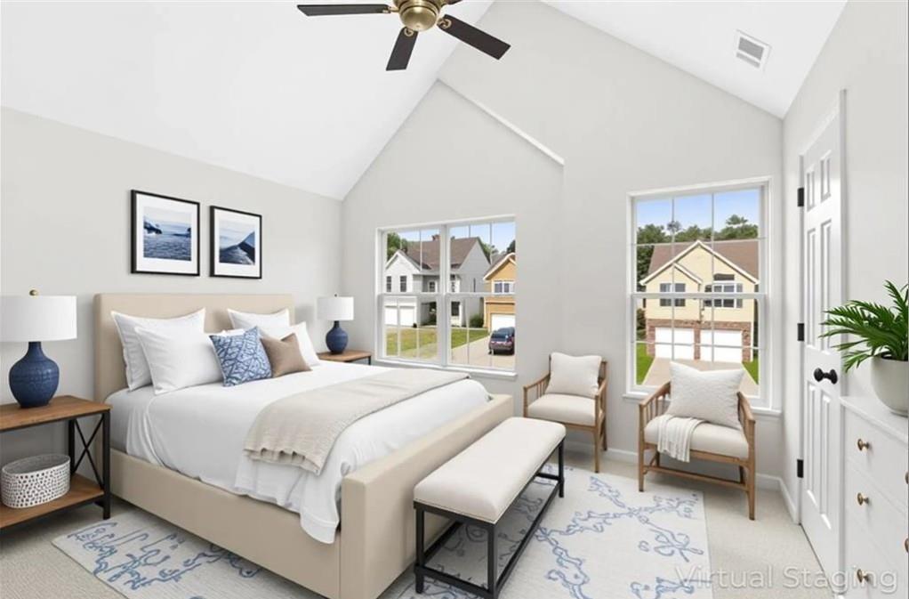 4095 Arch Pass Cumming, GA 30040 - Photo 18 of 31 a bedroom with a bed and a couch