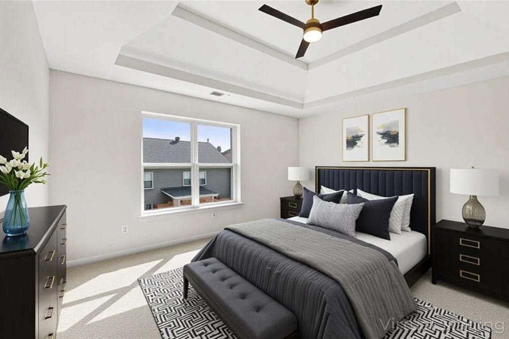 4095 Arch Pass Cumming, GA 30040 - Photo 23 of 31 a bedroom with a large bed and a window