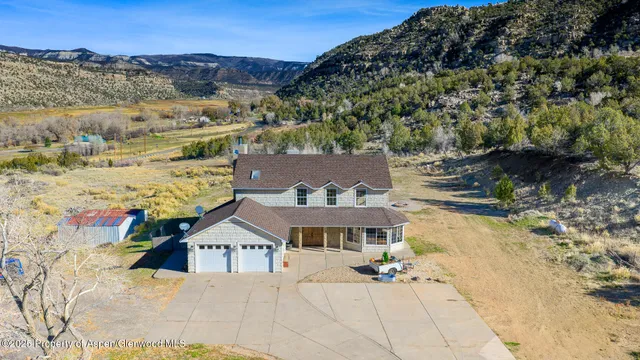 a view of a house with a mountain