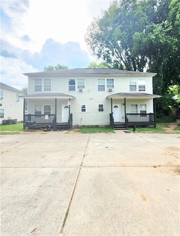 front view of a house with a street