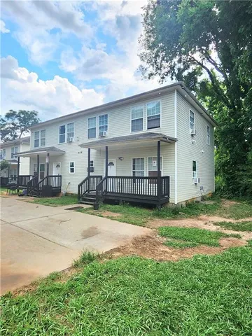 a view of a yard in front of a house