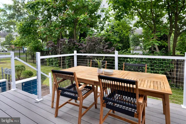 a view of balcony with furniture