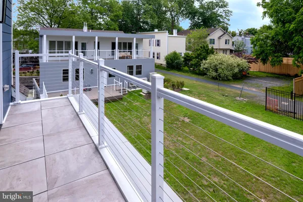 a view of balcony with deck and garden