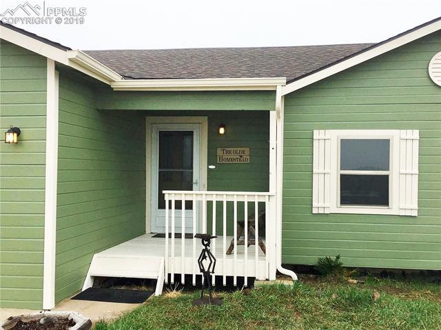 13415 Mc Cune Road Elbert, CO 80106 - Photo 2 of 8 Welcome home to the inviting front porch!