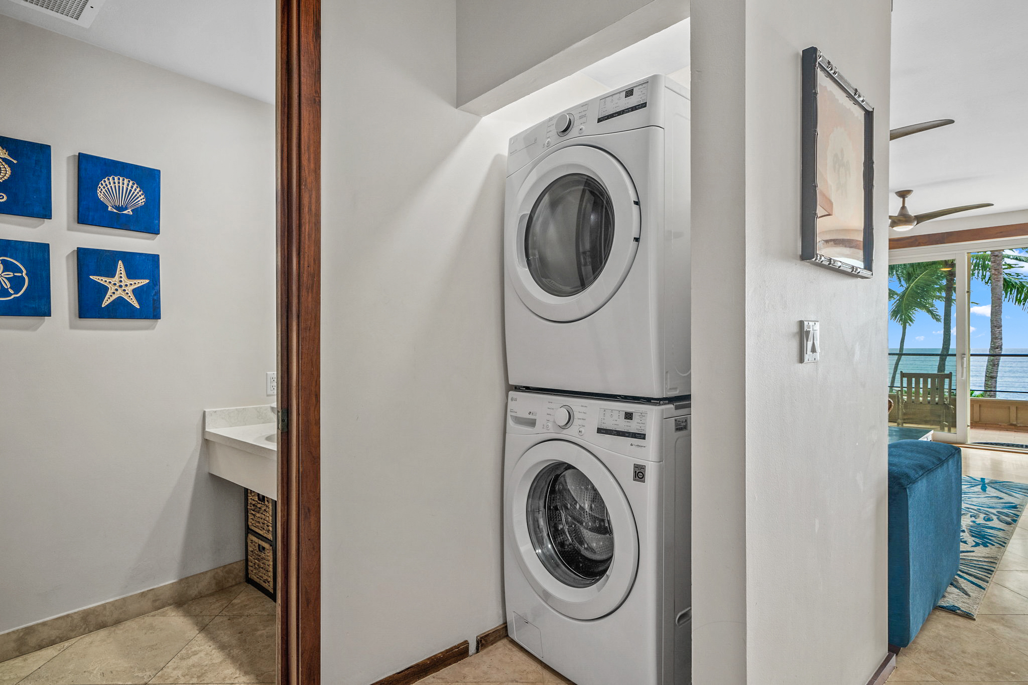 2640 Puuholo Road, Unit 231 Koloa, HI 96756 - Photo 12 of 30 a utility room with dryer and washer