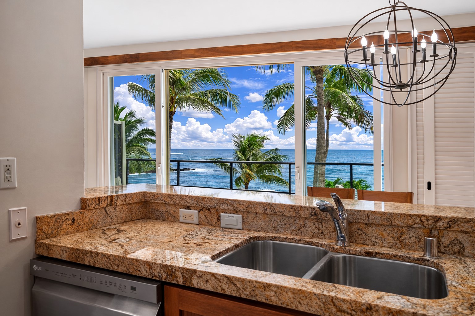 2640 Puuholo Road, Unit 231 Koloa, HI 96756 - Photo 2 of 30 a kitchen sink with a granite countertops and a large window