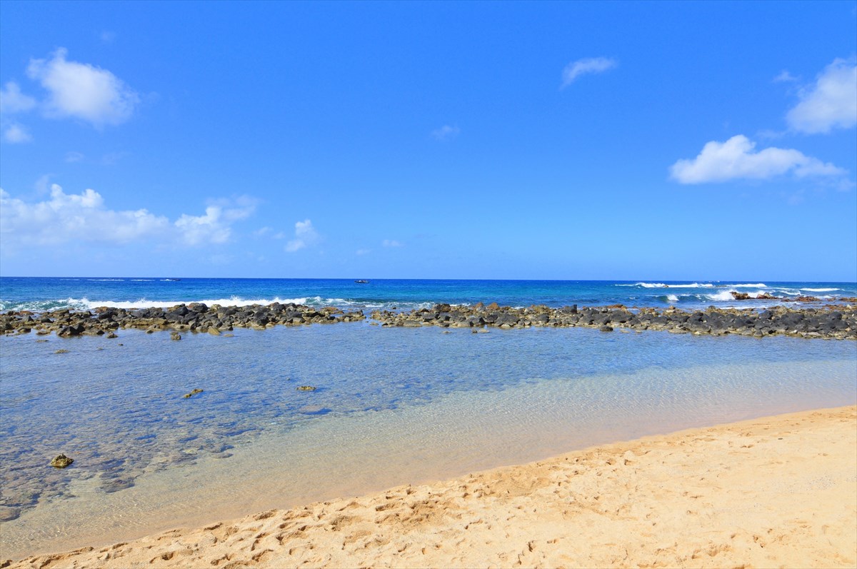 2640 Puuholo Road, Unit 231 Koloa, HI 96756 - Photo 26 of 30 a view of an ocean and beach