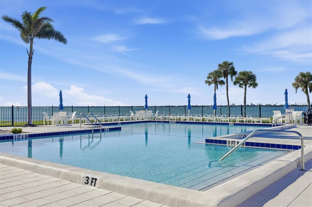 11000 Placida Road, Unit 302 Placida, FL 33946 - Photo 60 of 68 a view of a lake with a terrace