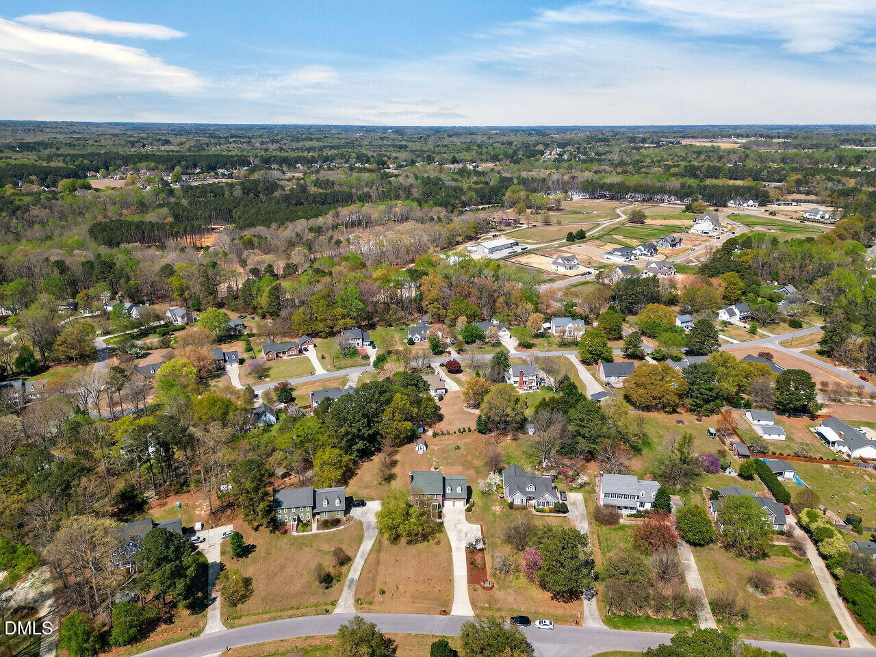 6104 Wolverhampton Drive Raleigh, NC 27603 - Photo 30 of 35 an aerial view of residential houses with outdoor space
