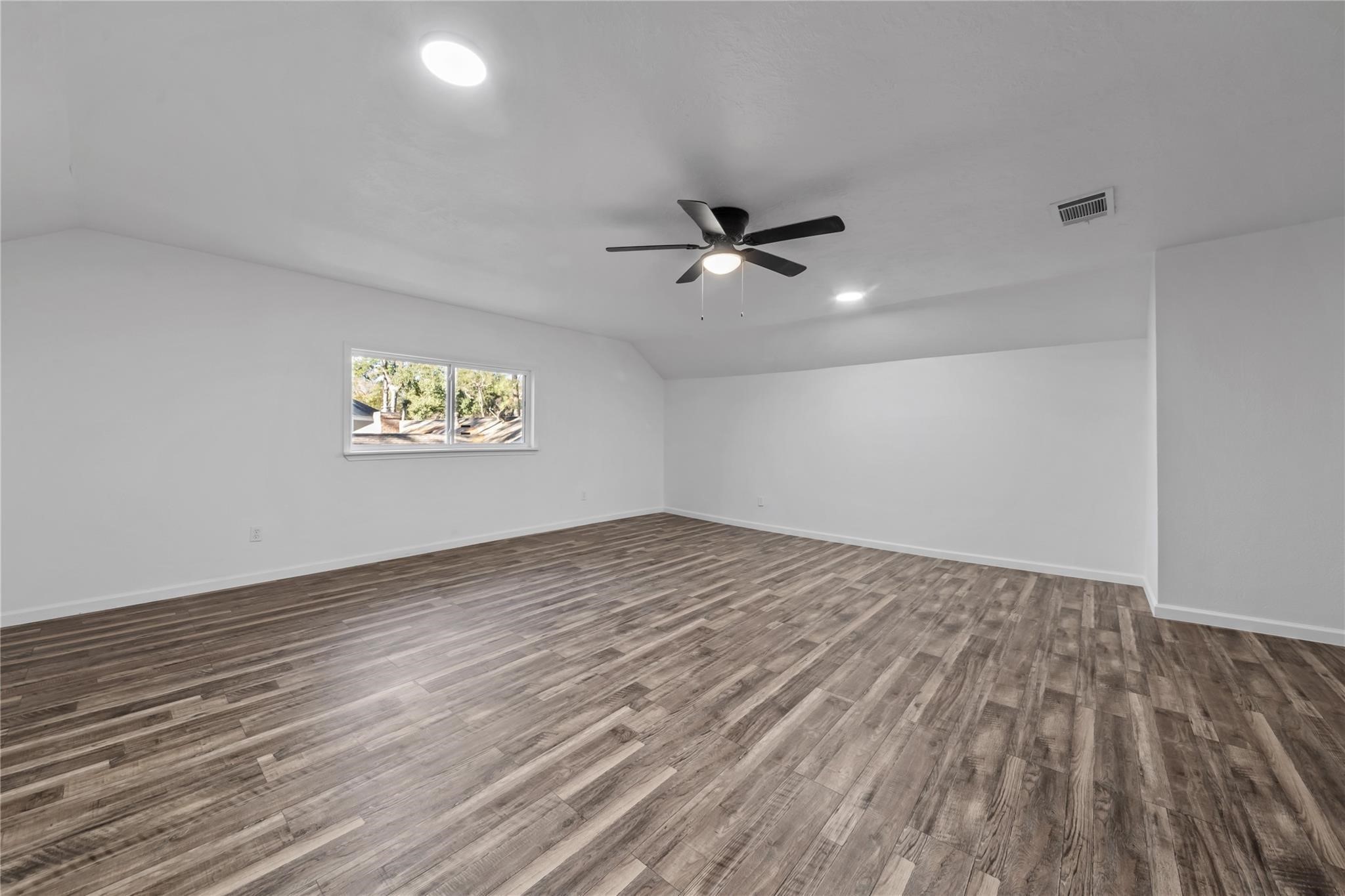 6611 Falling Waters Drive Spring, TX 77379 - Photo 15 of 16 a view of an empty room and window