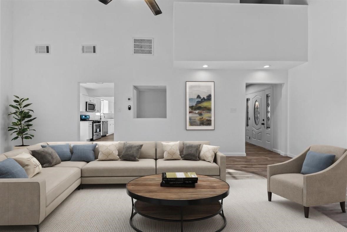 6611 Falling Waters Drive Spring, TX 77379 - Photo 3 of 16 a living room with furniture and a potted plant