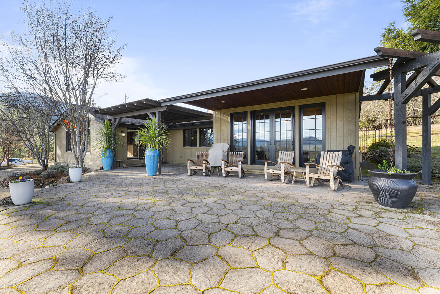 1052 Holcomb Springs Road Gold Hill, OR 97525 - Photo 21 of 65 Expansive Rear Patio and Outdoor Living Space
