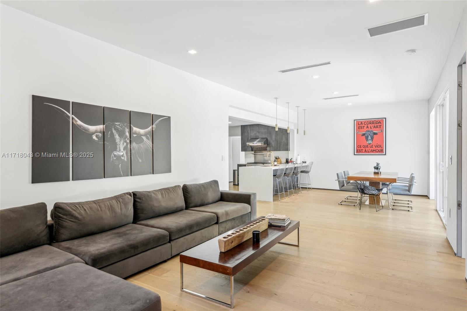 2725 Southwest 19th Street Miami, FL 33145 - Photo 24 of 49 a living room with furniture and a flat screen tv