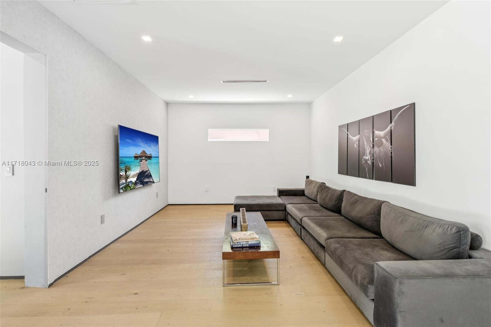 2725 Southwest 19th Street Miami, FL 33145 - Photo 25 of 49 a living room with furniture and a couch