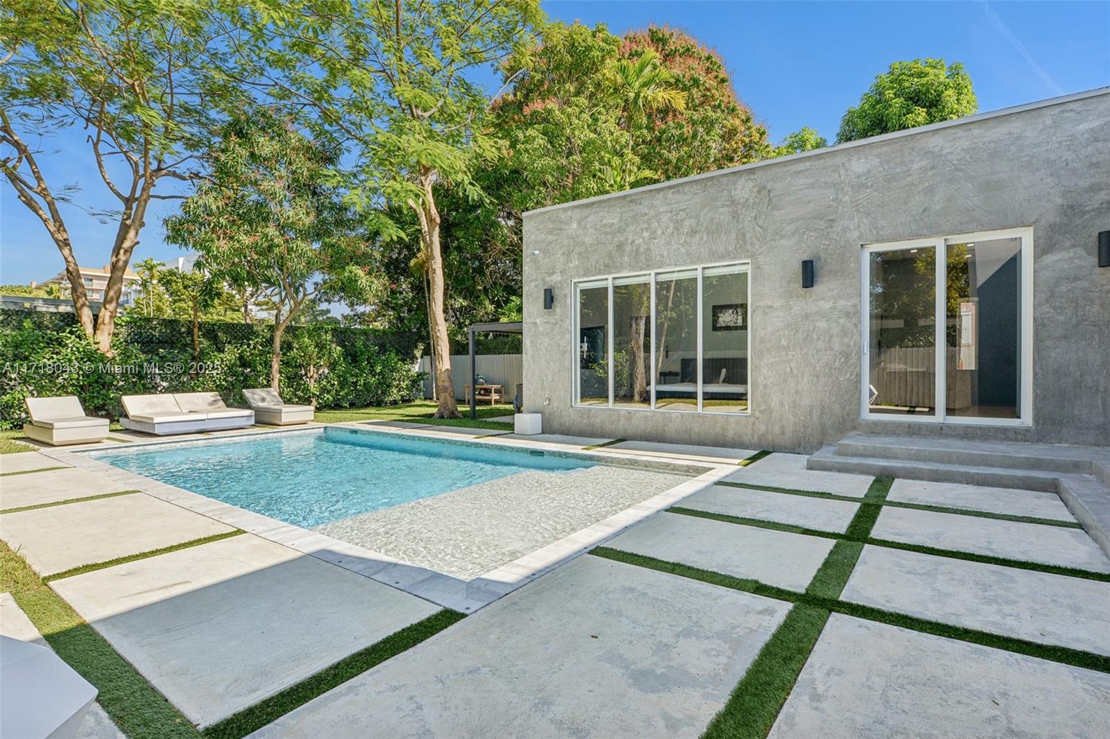 2725 Southwest 19th Street Miami, FL 33145 - Photo 33 of 49 front view of a house with a garden