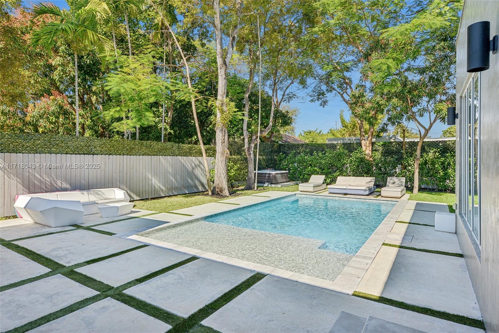 2725 Southwest 19th Street Miami, FL 33145 - Photo 37 of 49 swimming pool view with a seating space