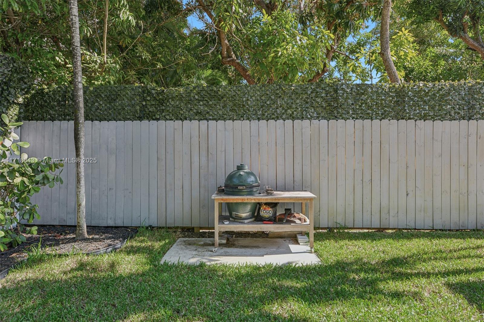2725 Southwest 19th Street Miami, FL 33145 - Photo 40 of 49 a garden view with a seating space