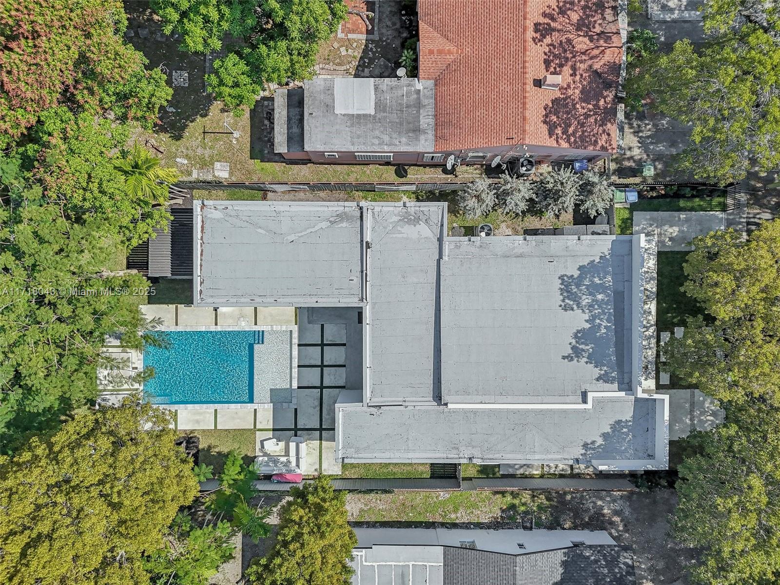 2725 Southwest 19th Street Miami, FL 33145 - Photo 45 of 49 an aerial view of a house with a yard and large tree
