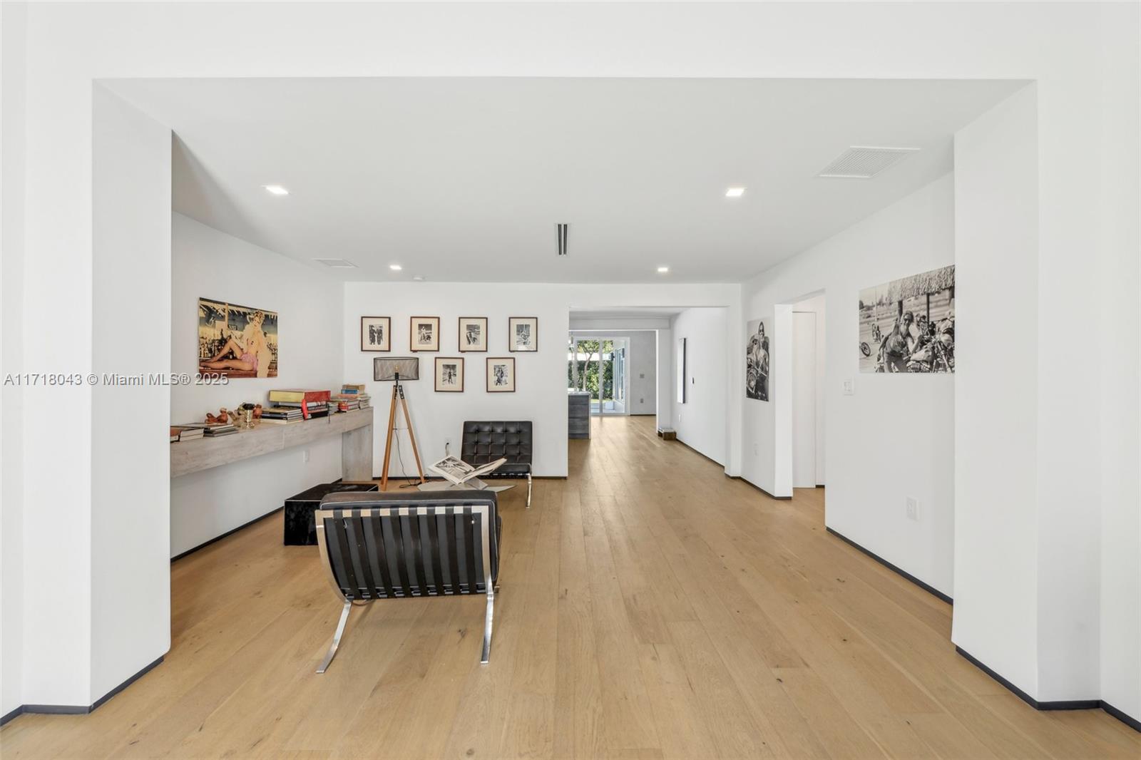 2725 Southwest 19th Street Miami, FL 33145 - Photo 49 of 49 a living room with furniture and a fireplace