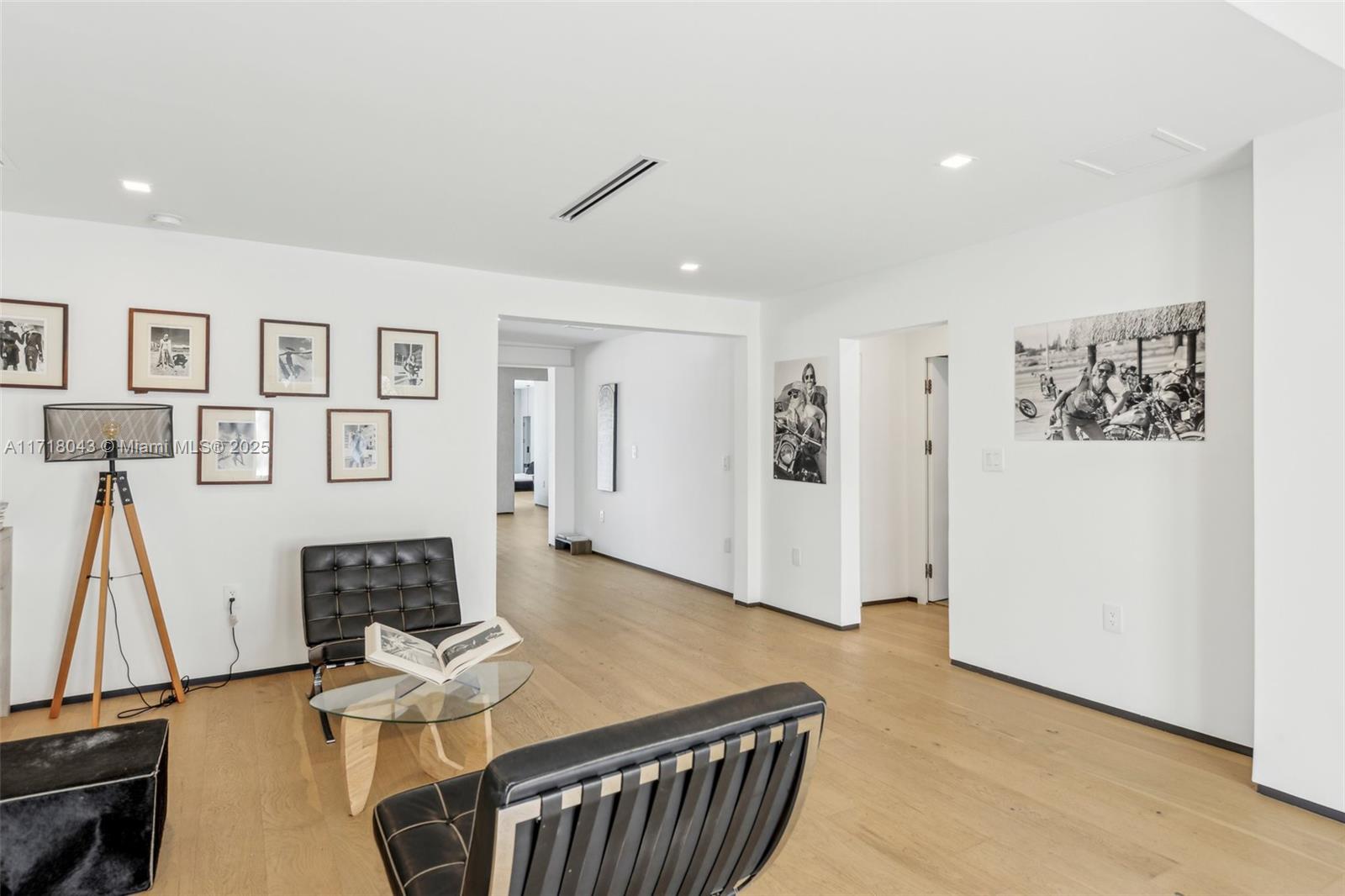 2725 Southwest 19th Street Miami, FL 33145 - Photo 10 of 49 a living room with furniture and a wooden floor