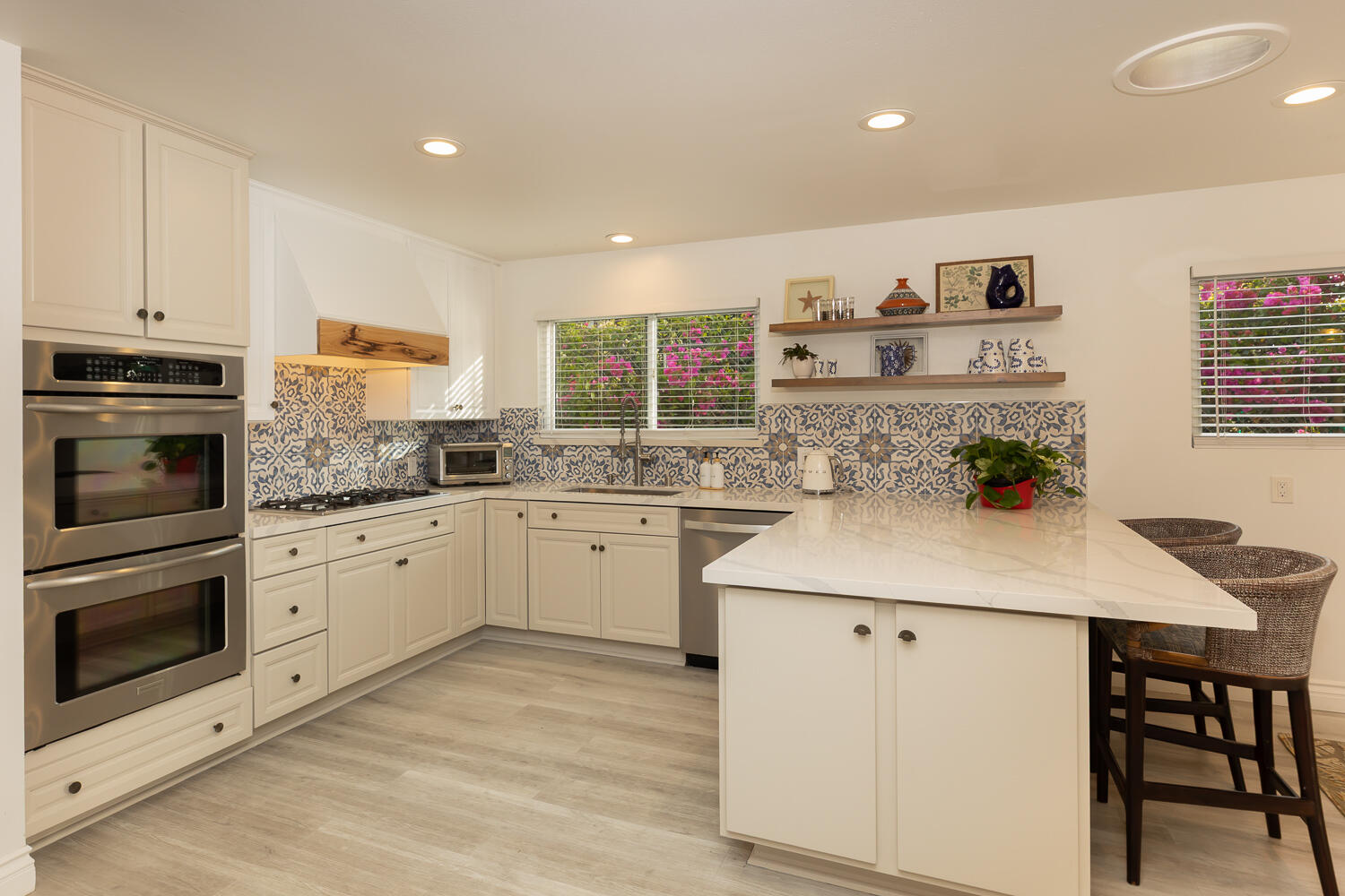 5402 Cameo Road Carpinteria, CA 93013 - Photo 7 of 28 a kitchen with a stove a sink and a refrigerator