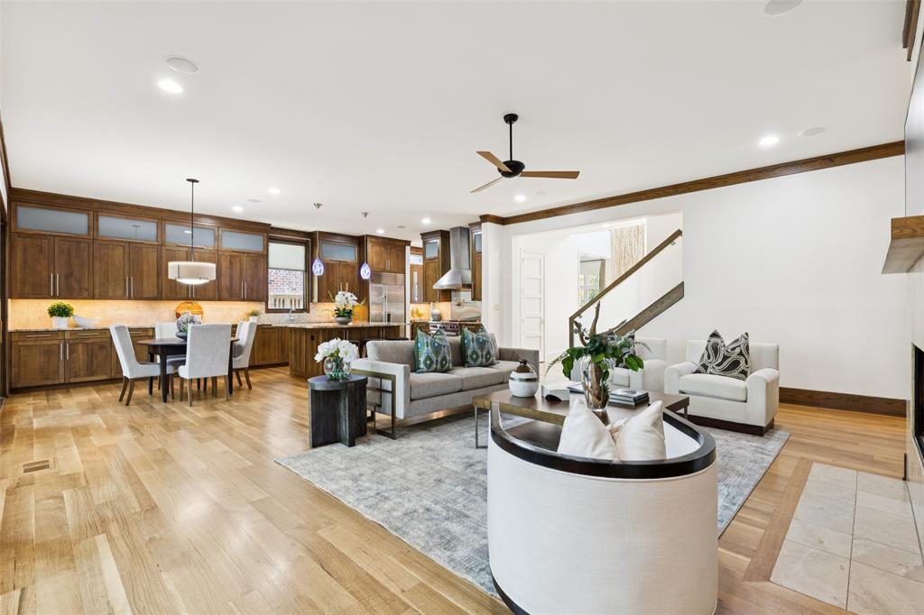 6757 Lakefair Circle Dallas, TX 75214 - Photo 11 of 40 a living room with furniture and wooden floor