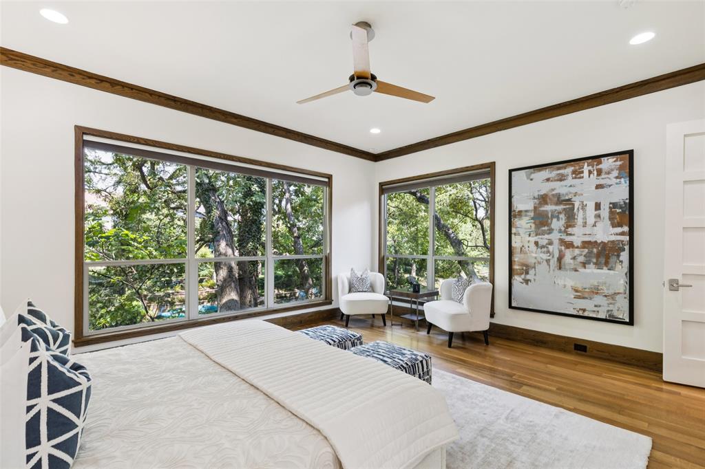 6757 Lakefair Circle Dallas, TX 75214 - Photo 19 of 40 a living room with furniture and large windows