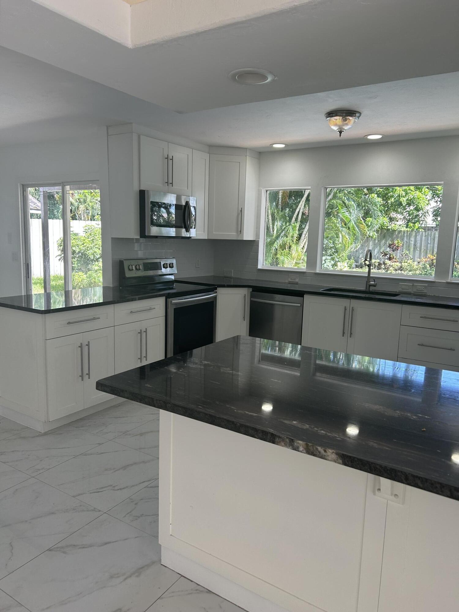 1260 Southwest 19th Street Boca Raton, FL 33486 - Photo 4 of 25 1260 kitchen 2