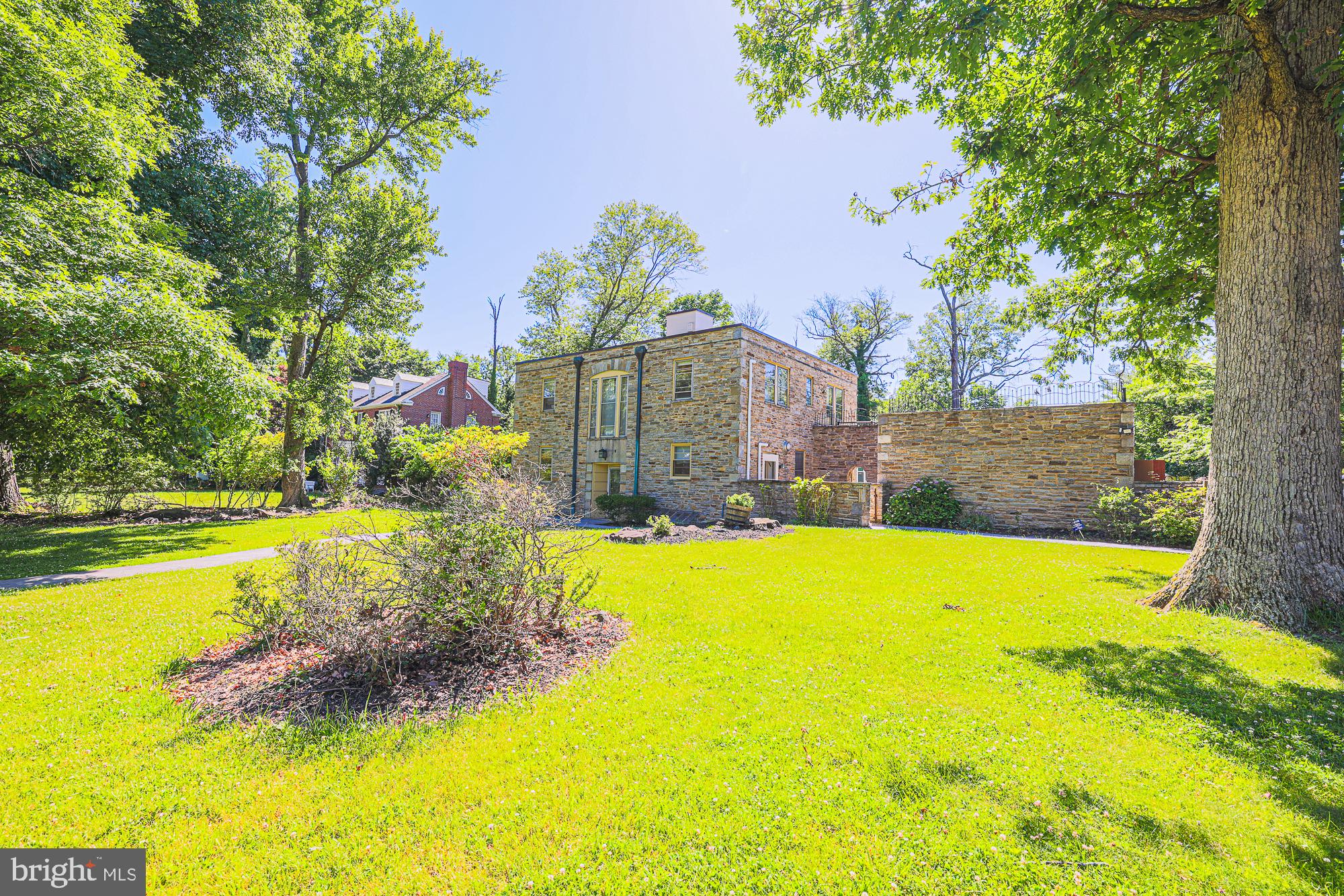 3305 Bancroft Road Baltimore, MD 21215 - Photo 2 of 61 Charming stone home in lush greenery.