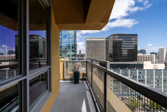 a balcony with a city view