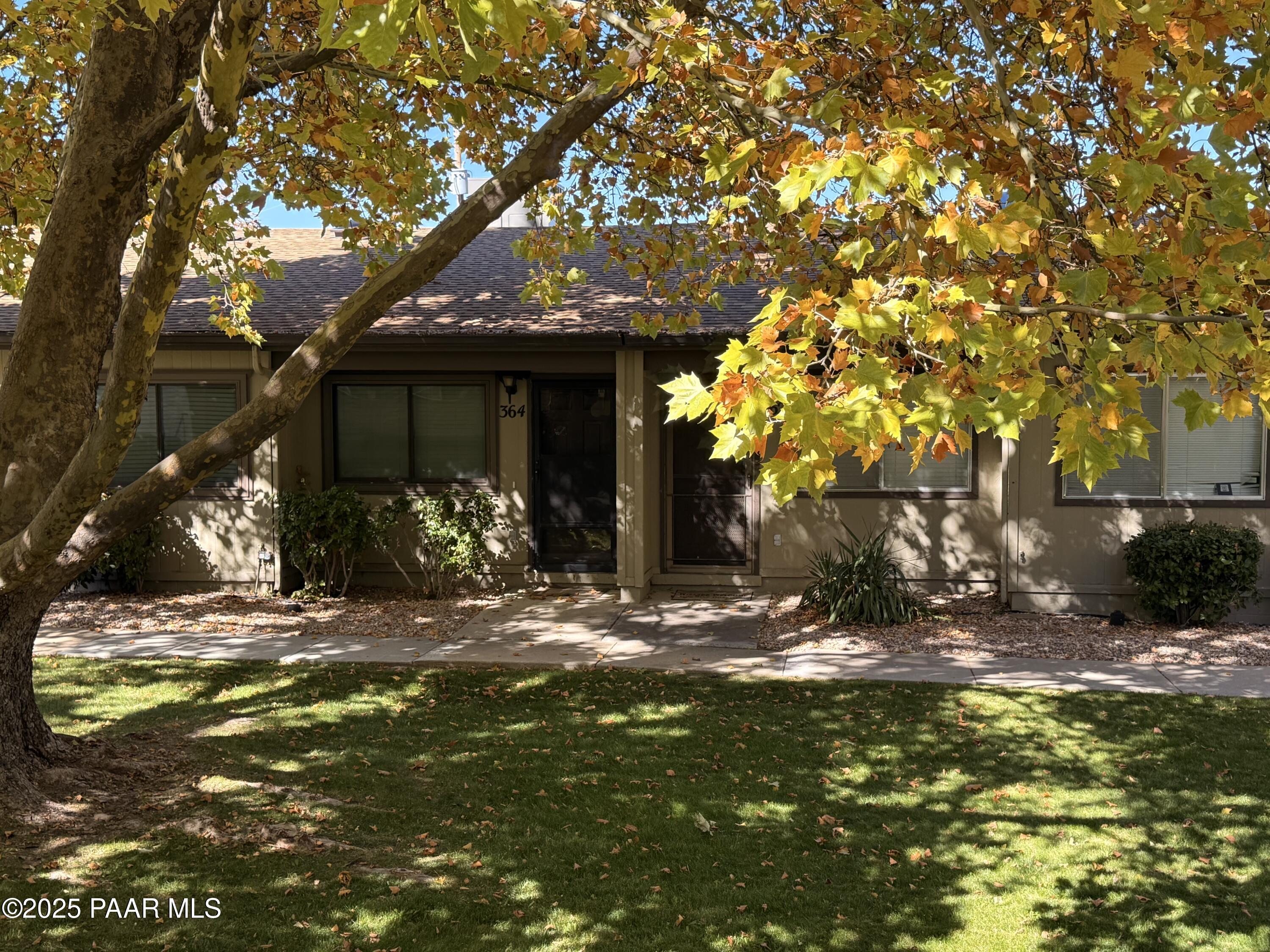 341 Country Club Circle Prescott, AZ 86303 - Photo 3 of 21 a view of a house with yard tree and outdoor space