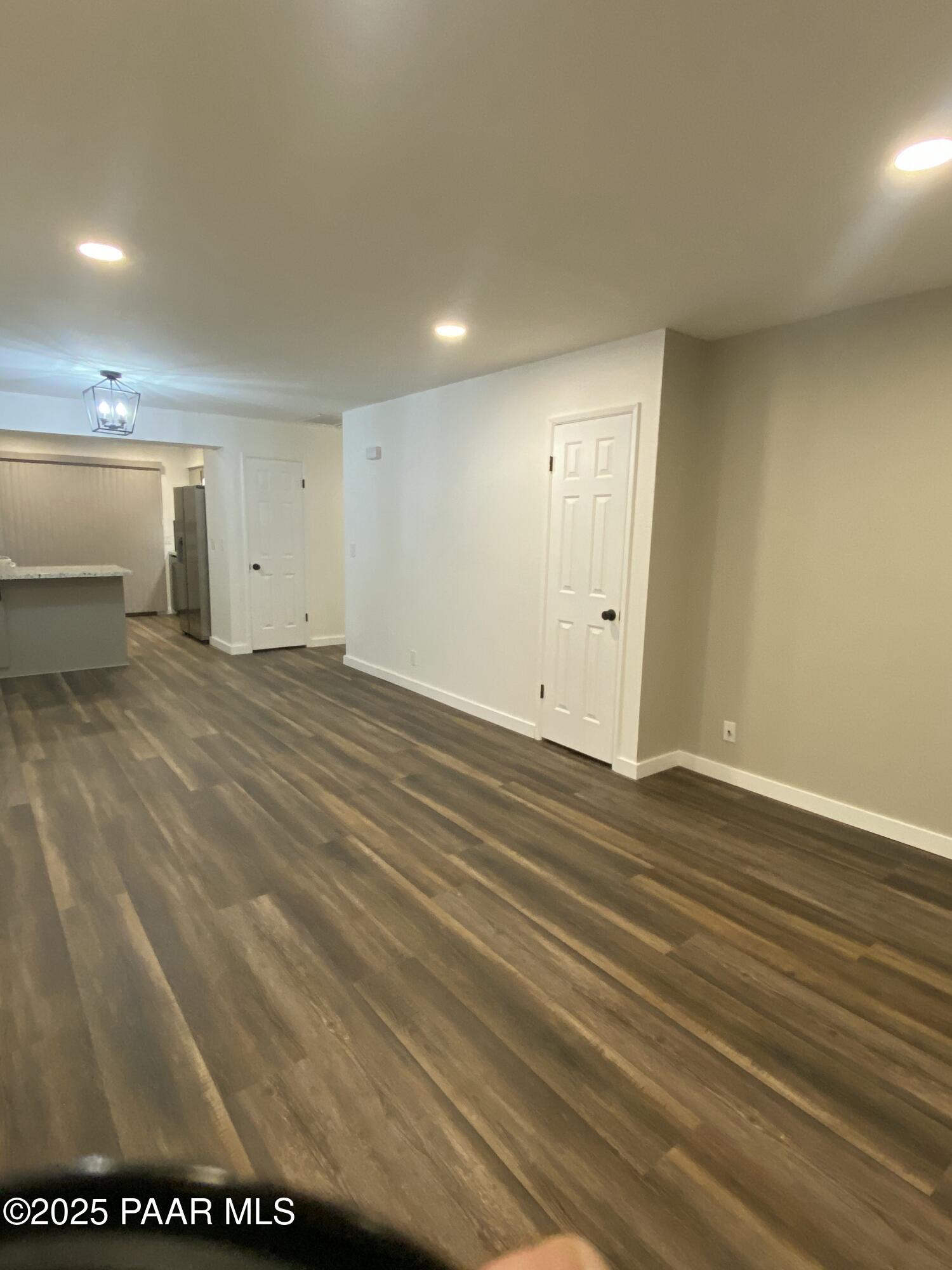 341 Country Club Circle Prescott, AZ 86303 - Photo 7 of 21 a view of a room with wooden floor