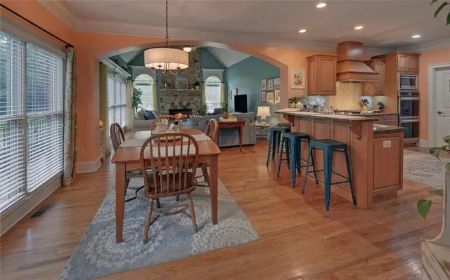 a living room with furniture and a walk in closet