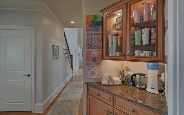 a bathroom with a shower curtain and a toilet