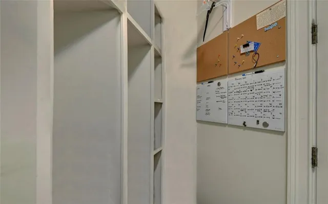 a view of a garden with a building in the background