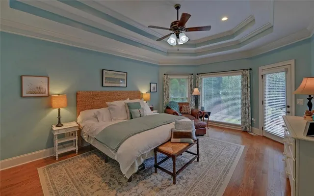 an aerial view of a residential houses with outdoor space and street view