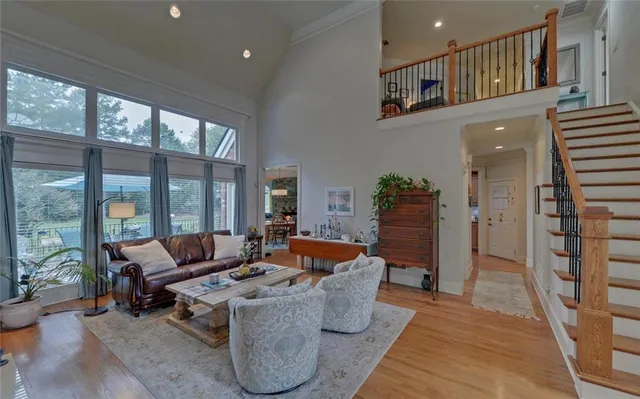a living room with fireplace furniture and a flat screen tv