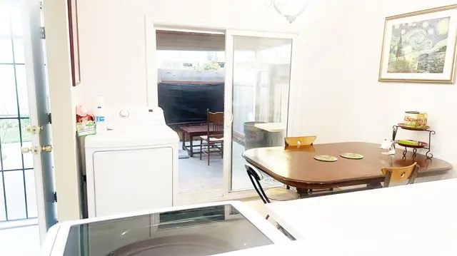 a house view with a backyard space