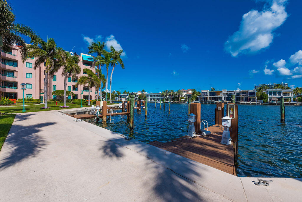 a view of a lake with a building in the background