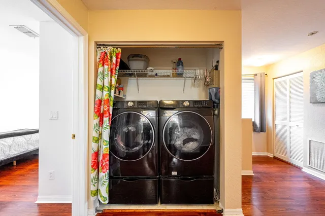 a utility room with dryer and washer