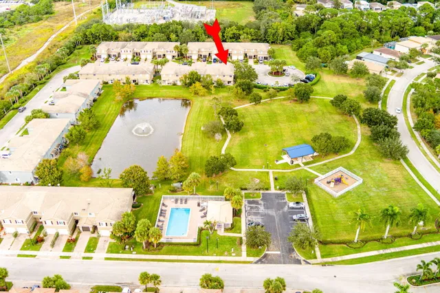 a view of a street with a garden